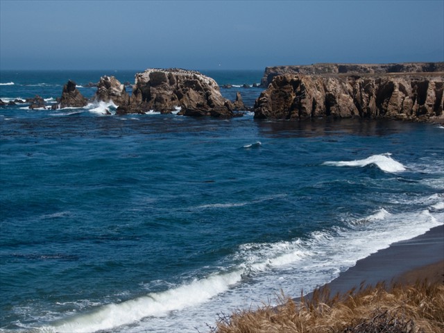 Sea caves and Pacific Ocean coastline Sea caves and Pacific Ocean coastline